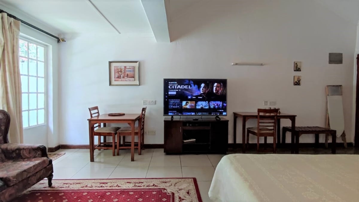 Hotel Nairobi Kenya nomad remote 31d441ac-ad3d-4989-89eb-9cc36d118d0b_2C6SITTINGBEDROOM1920x1080.jpg
