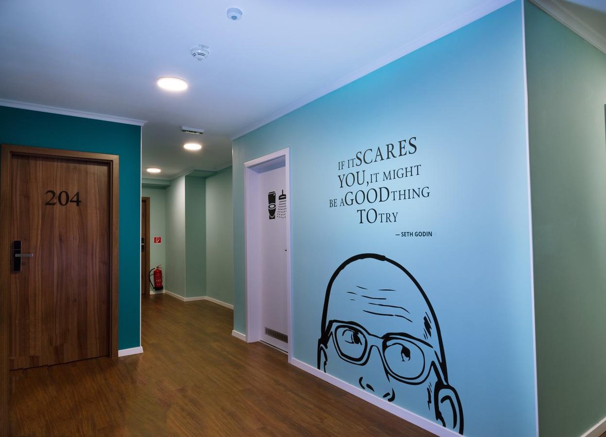 Hotel Bratislava Slovakia nomad remote b3685af9-a9af-4b35-9b16-9484372556b3_NS- Dream Hostel Brataslava Seth Goden Mural.jpg