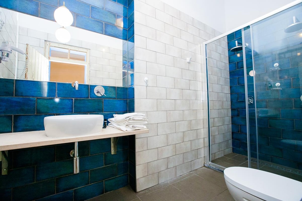 Hotel Lisbon Portugal nomad remote 927d8322-a4ea-449d-92e6-fb0df0d667be_NS- Hub 18 Faro Lisbon Bath.jpg