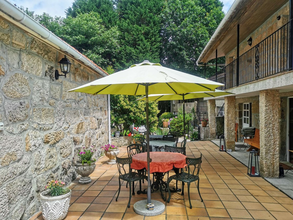 Hotel Ponte Caldelas Spain nomad remote c0e898dd-f94a-4335-8e89-fbe360afabb2_Anceu Coliving - Outdoor Dining Area 3.jpg